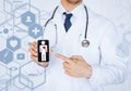 Male doctor with stethoscope and virtual screen Royalty Free Stock Photo