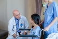 Male doctor talking with female patient. healthcare concept Royalty Free Stock Photo