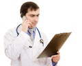 Male doctor talking on the phone Royalty Free Stock Photo