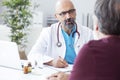 Male doctor talking to patient Royalty Free Stock Photo