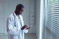 Male doctor using digital tablet in hospital Royalty Free Stock Photo