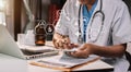 Male doctor working on digital tablet healthcare doctor technology tablet using computer. Royalty Free Stock Photo