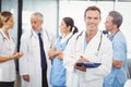 Male doctor writing on clipboard Royalty Free Stock Photo