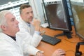 2 male doctors searching tumor on scanner Royalty Free Stock Photo