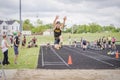 Triple Jump at High School Track Meet Royalty Free Stock Photo