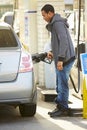 Male Driver Filling Car At Gas Station Royalty Free Stock Photo