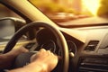 Male driver& x27;s hands on wheel driving high speed movement sitting inside car. Man guy holding steering wheel over Royalty Free Stock Photo