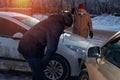 Male drivers on city street after car crash Royalty Free Stock Photo