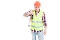 Male electrician constructor holding extension cord on shoulder