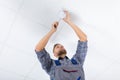 Male Electrician Fixing Smoke Detector Royalty Free Stock Photo