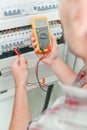 male electrician using device Royalty Free Stock Photo