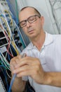 Male electrician working on fusebox Royalty Free Stock Photo