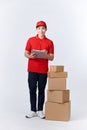 Male employee in cap t-shirt print working as courier dealer hold empty cardboard box