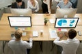 Employees using computers working with staff in office, top view Royalty Free Stock Photo