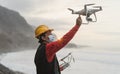 Male engineer doing inspection using drone