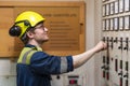 Young marine engineer during his daily routine work in engine room. Seafarers life. Royalty Free Stock Photo