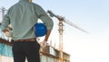 The male engineer is inspecting the building structure in the construction site Royalty Free Stock Photo