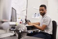 Male Engineer Uses CMM Coordinate Measuring Machine In Factory