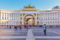 Male entertainer in period outfit awaiting tourists by the Arch of Triumph on Palace Square Saint Petersburg, Russia