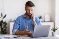 Male Entrepreneur Having Problems With Computer At Work, Talking With Customer Support Royalty Free Stock Photo