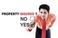 Male entrepreneur with text of property insured Royalty Free Stock Photo