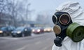 Male environmentalist in protective suit standing on the street.