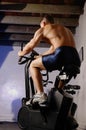 Male on exercise bike