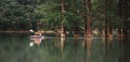 Male explorer kayaking on lake Sukko.