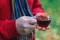 Male in fall forest walking and drink hot tea Royalty Free Stock Photo