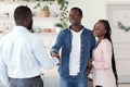 Male Family Therapist And Happy Black Couple Handshaking In Office After Meeting Royalty Free Stock Photo