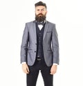 Male fashion concept. Hipster wears smart suit. Male fashion and hairstyle
