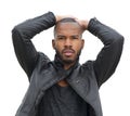 Male fashion model posing in black leather jacket