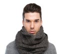 Male fashion model posing with gray wool scarf Royalty Free Stock Photo
