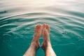 Male feet in outdoor swimming pool Royalty Free Stock Photo