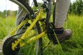 Male feet on pedals, bike, mountain. Wheel Royalty Free Stock Photo