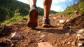 Male feet run through rocky terrain. Cross country running with focus on legs