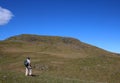 Male fellwalker on slopes of Hallin Fell, Cumbria