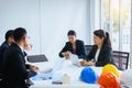 Male and female architect working and discussing in office,Start up new project Royalty Free Stock Photo