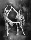 Male and female ballet dancers performing in costume Royalty Free Stock Photo