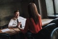 Male and female business coleagues discussing work