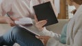 Male and female calculating together, mortgage from bank, interest rate count