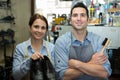 male and female cobbler posing