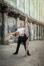 Girl and guy dancers perform a passionate dance together outdoors in nature