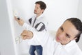 male and female decorating team working together Royalty Free Stock Photo