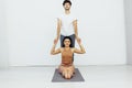 Male and female doubles yoga asana gymnastics fitness