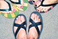 Male and female feet in slippers Royalty Free Stock Photo