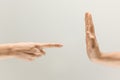 Male and female hands isolated on grey studio background