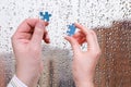 Male and female hands with little puzzle pieces Royalty Free Stock Photo
