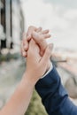 Male and female hands reach out to each other and touch the sky with their fingers Royalty Free Stock Photo