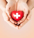 Male and female hands with red heart Royalty Free Stock Photo